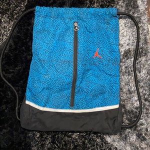Draw string jordan bag (black and blue )
Used once